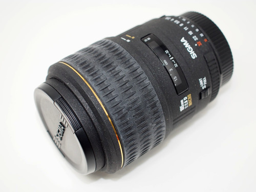 Sigma 105 2 - ex, ex